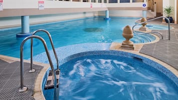 Indoor pool, open 8:00 AM to 8:00 PM, pool loungers