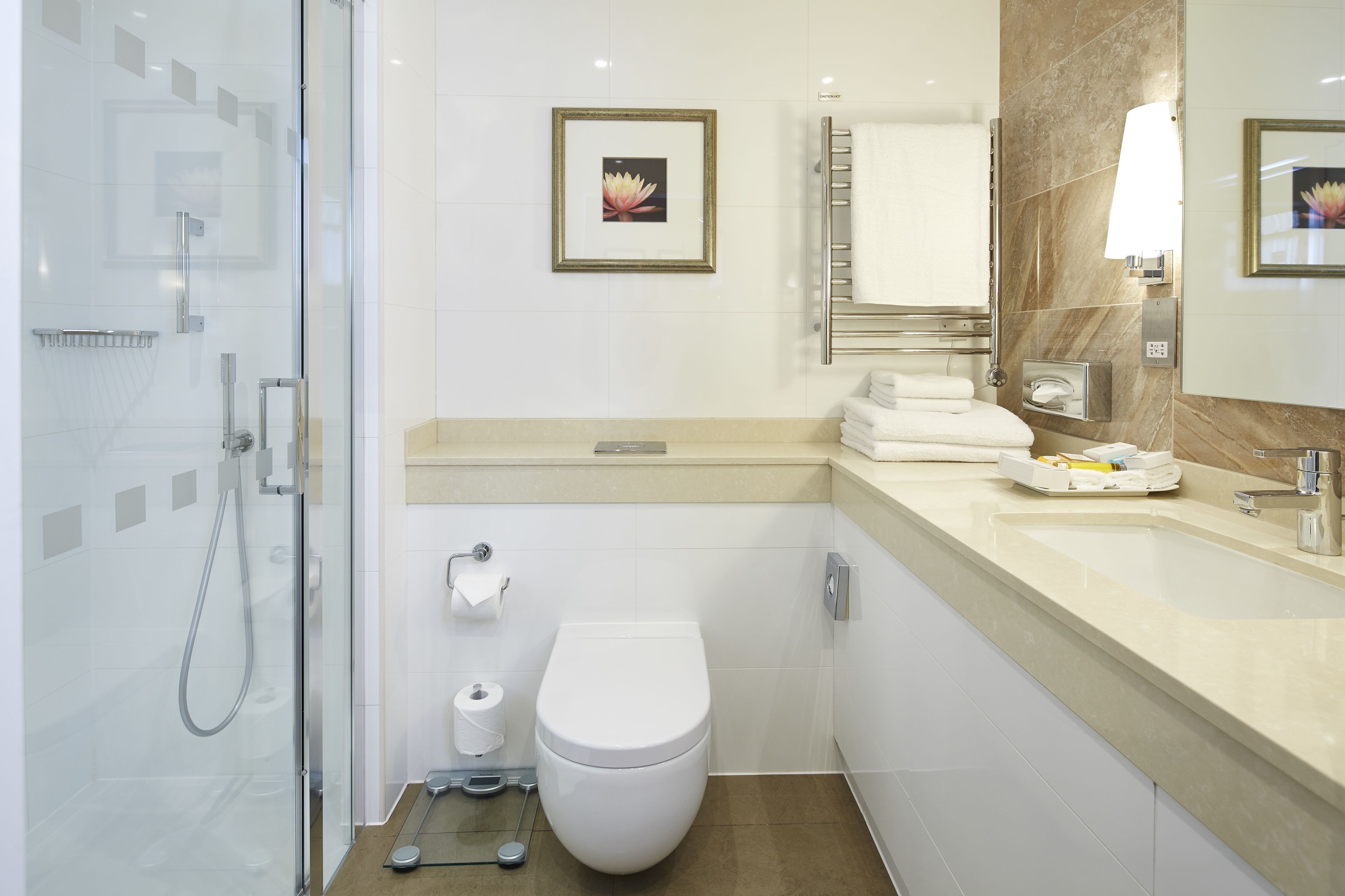 club room | bathroom | separate bathtub and shower, designer toiletries, hair dryer, towels