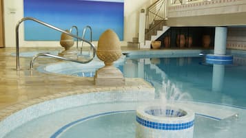 Indoor pool, open 8:00 AM to 8:00 PM, pool loungers