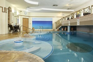 Indoor pool, open 8:00 AM to 8:00 PM, pool loungers