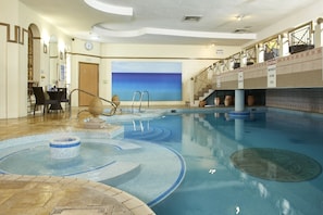 Indoor pool, open 8:00 AM to 8:00 PM, pool loungers