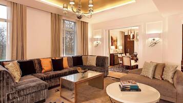 Grand Suite, 1 Bedroom | Living area | 32-inch plasma TV with digital channels, TV, pay films