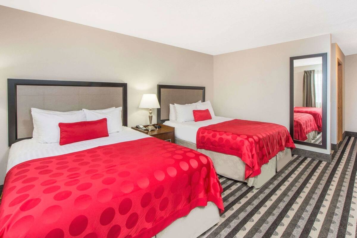 Premium bedding, desk, blackout drapes, iron/ironing board
