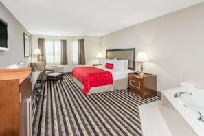 Deluxe Room, 1 King Bed, Non Smoking | Premium bedding, desk, blackout curtains, iron/ironing board