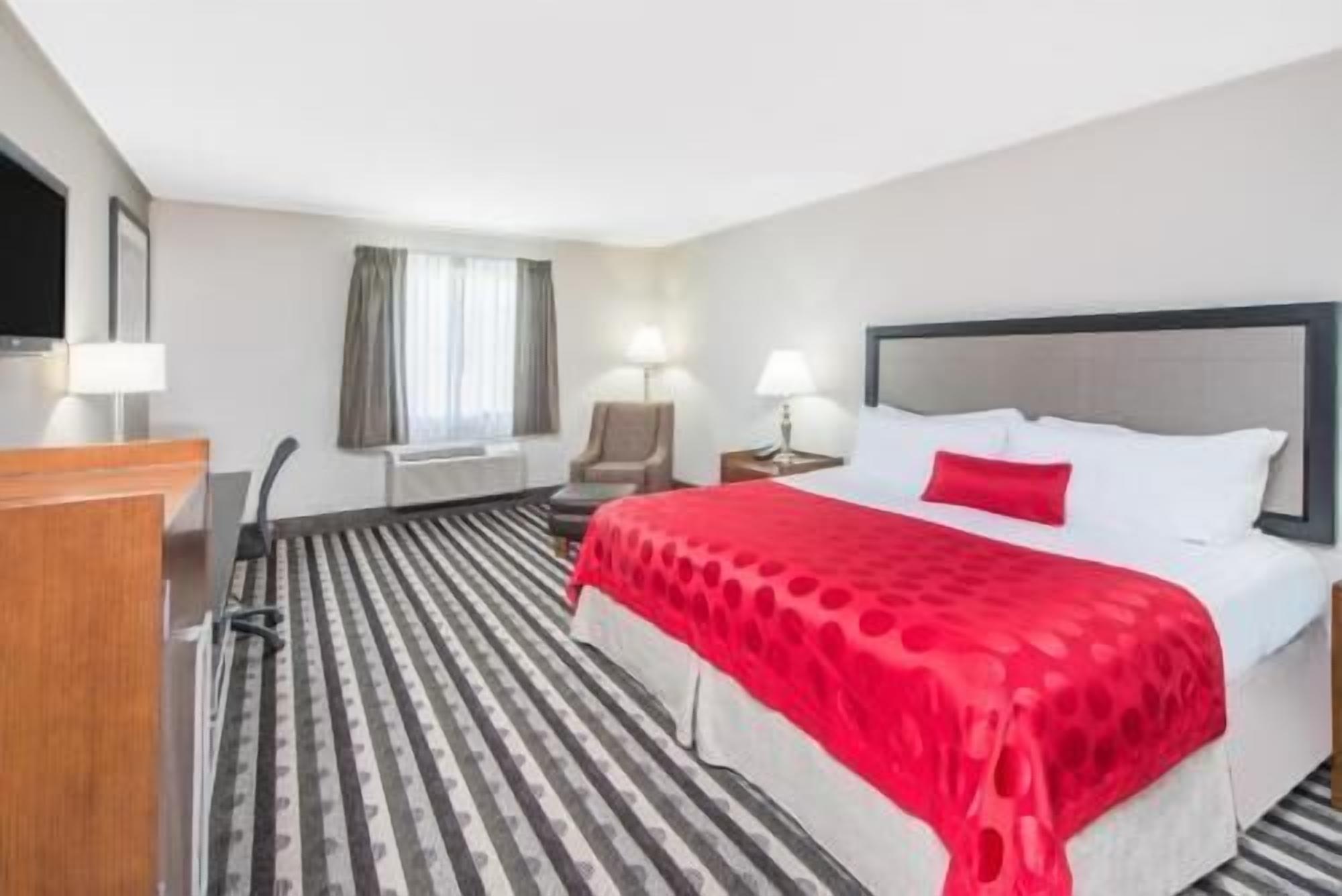 Premium bedding, desk, blackout drapes, iron/ironing board