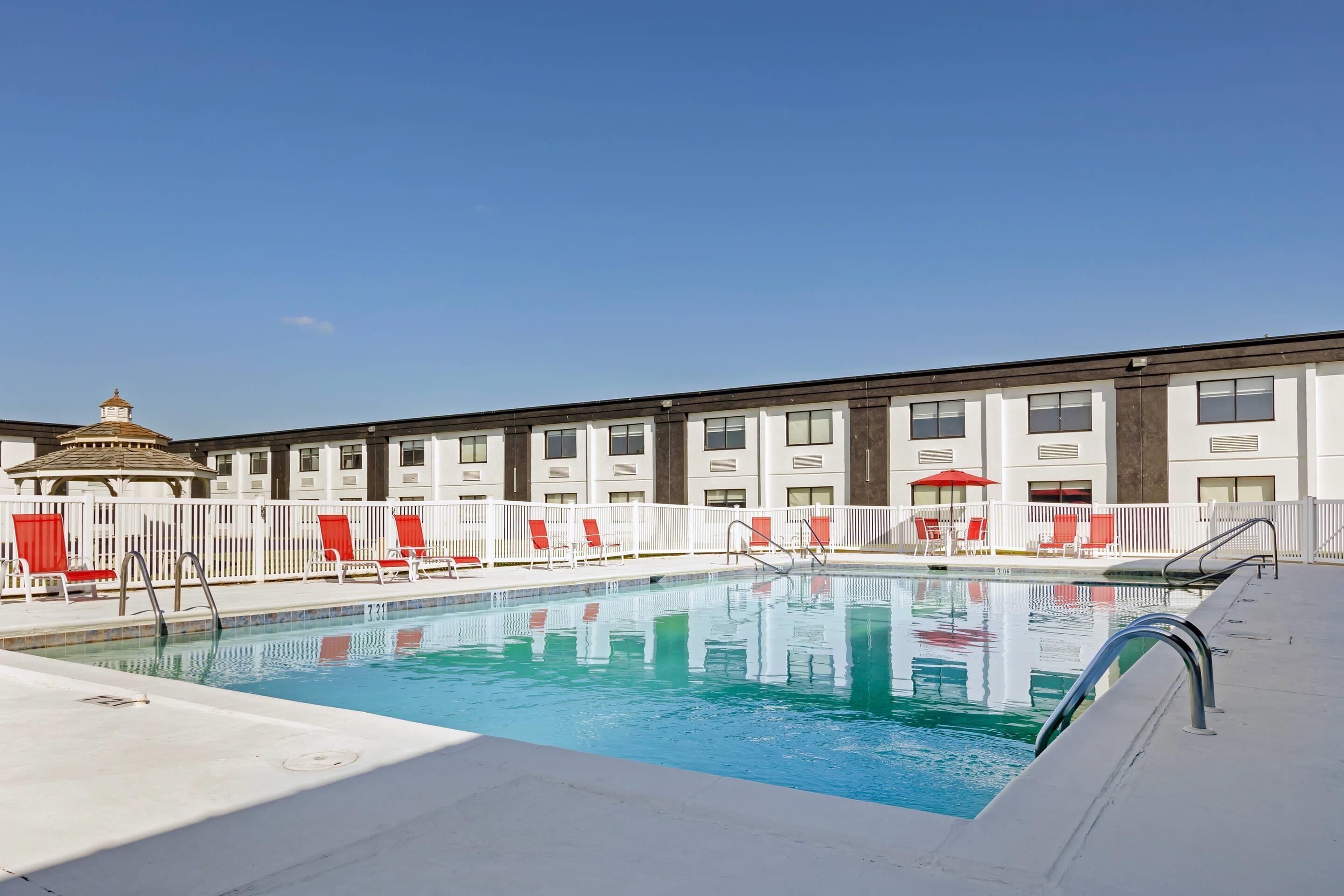 Seasonal outdoor pool, open 9:00 AM to 9:00 PM, sun loungers