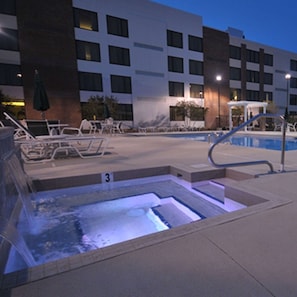 Outdoor pool, open 7:00 AM to 10:00 PM, pool umbrellas, sun loungers