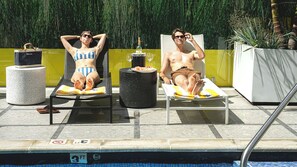 Outdoor pool, open 9:00 AM to 10:00 PM, sun loungers