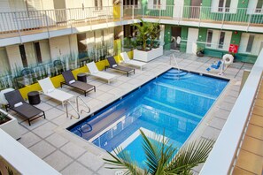 Outdoor pool, open 9:00 AM to 10:00 PM, sun loungers