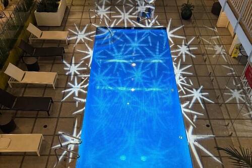 Outdoor pool, open 9:00 AM to 10:00 PM, pool loungers