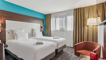 Ropa de cama de alta calidad, minibar y escritorio