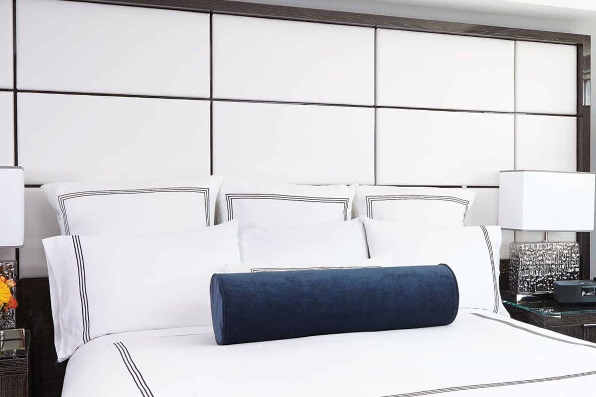 Premium bedding, down duvets, pillow-top beds, in-room safe