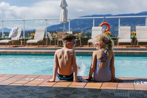 Outdoor pool, open 8:00 AM to 9:00 PM, pool loungers