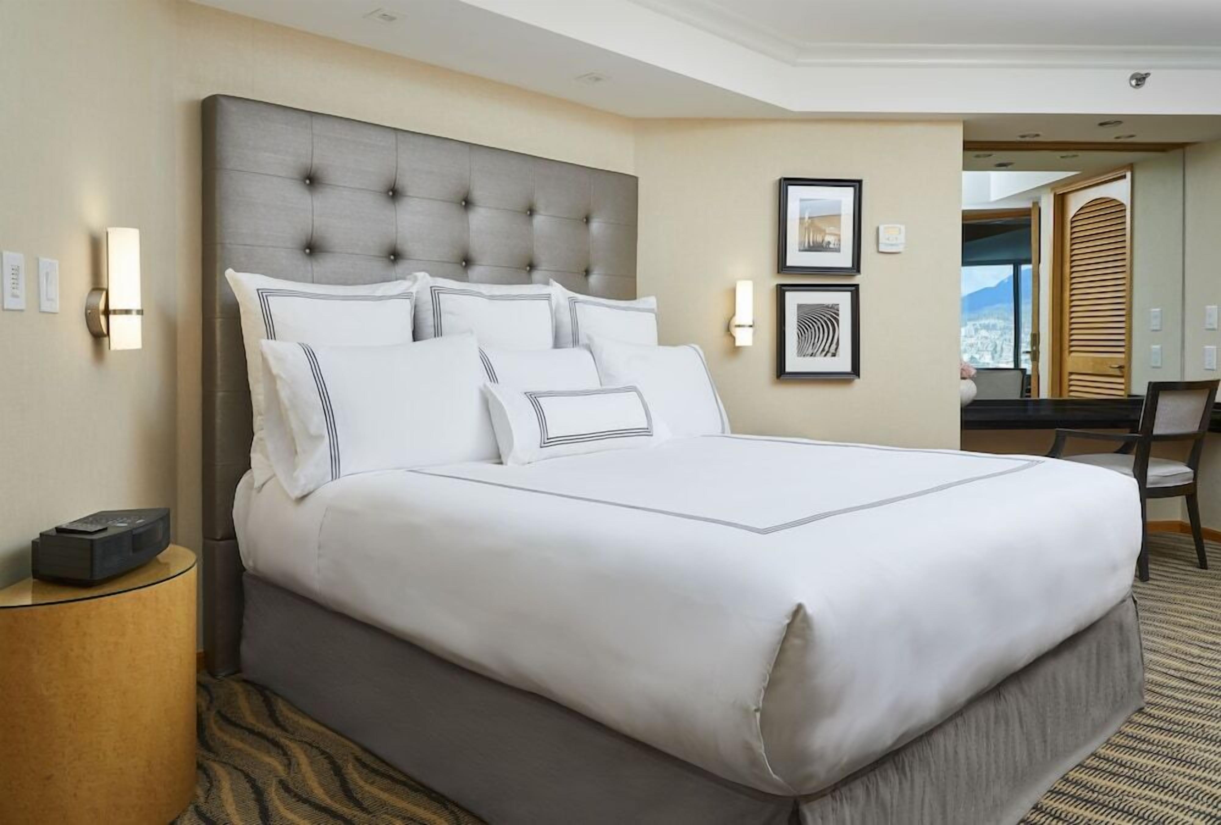 Premium bedding, down comforters, pillowtop beds, in-room safe