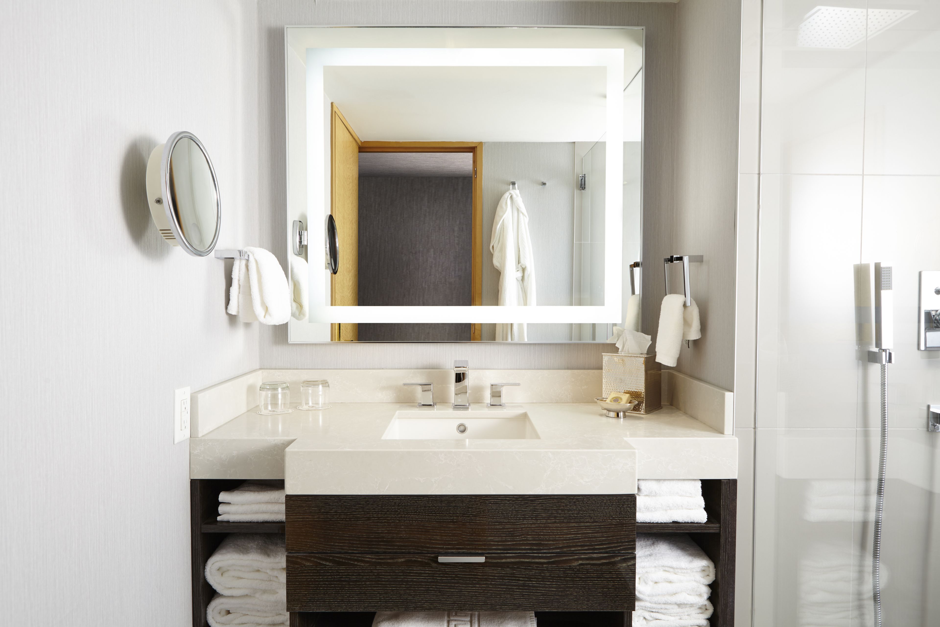 designer toiletries, hair dryer, bathrobes, towels