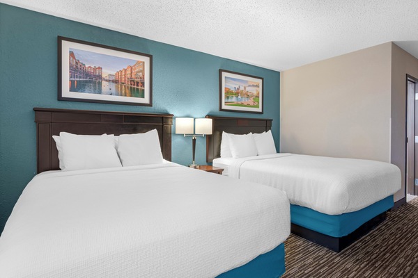 Suite, 2 Queen Beds, Non Smoking, Refrigerator & Microwave | Desk, laptop workspace, blackout drapes, iron/ironing board