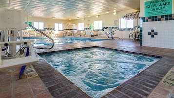 Indoor pool, open 6:00 AM to 11:00 PM, pool loungers