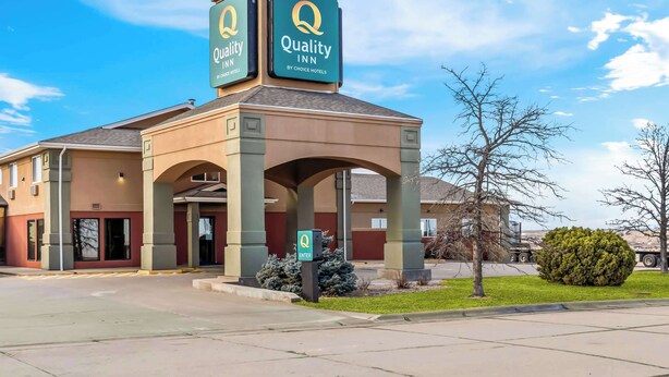 A Quality Inn by Choice Hotels with a prominent entrance and signage.