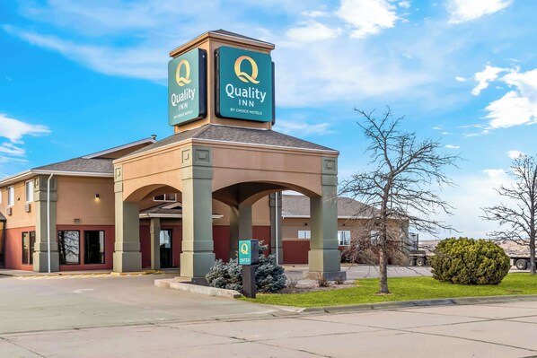 A Quality Inn by Choice Hotels with a prominent entrance and signage.