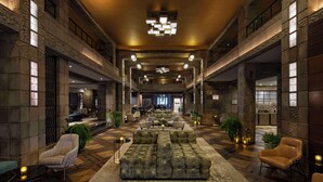 A spacious lobby with a central seating area, multiple seating options, and a modern chandelier. - Arizona Biltmore, LXR Hotels & Resorts (Phoenix)