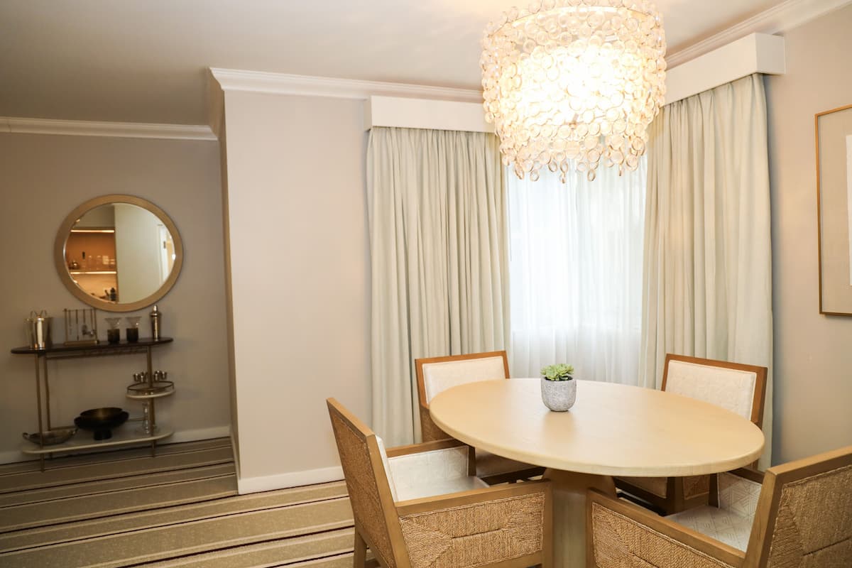 Club Suite, 1 King Bed, Accessible (Club Premier Suite, Roll In Shower) | Living area | 55-inch LCD TV with cable channels, TV, DVD player