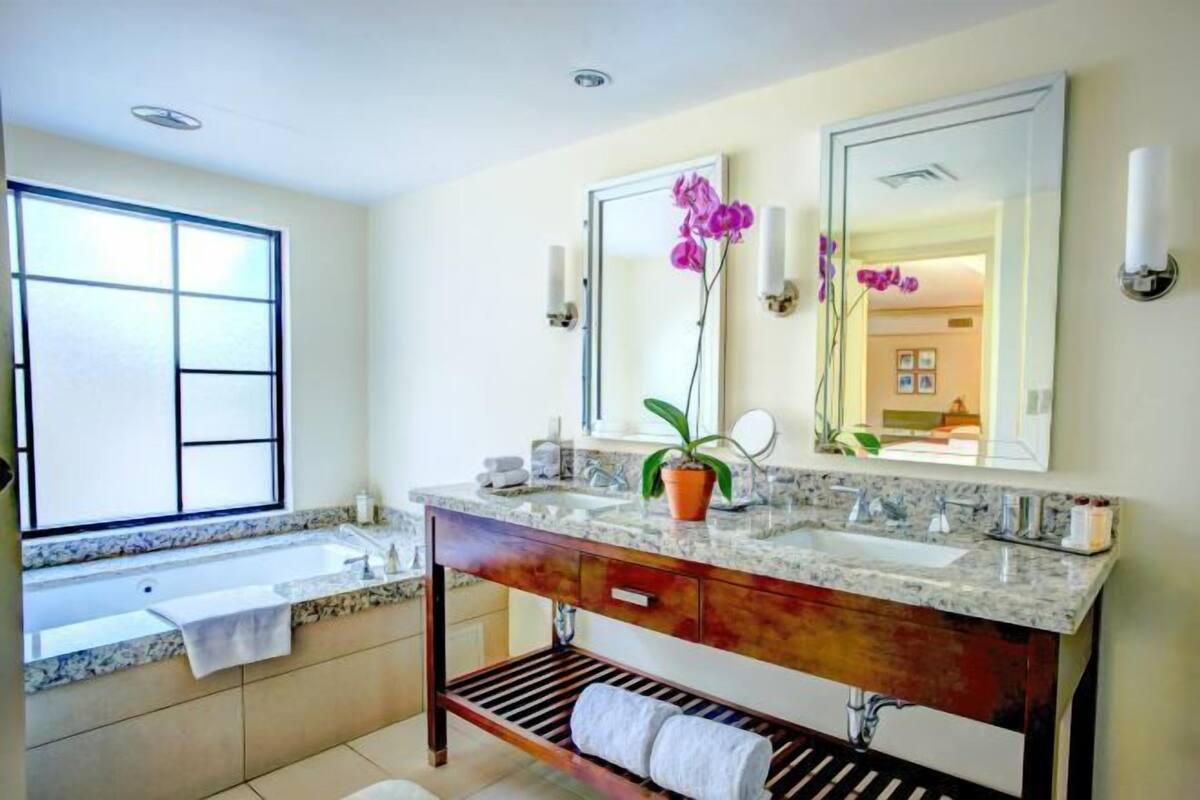 Bathroom | Designer toiletries, hair dryer, bathrobes, towels