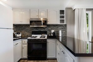 Standard Townhome, Multiple Beds, Non Smoking, Kitchen (Living Room;with Sofabed) | Private kitchenette | Microwave, coffee/tea maker
