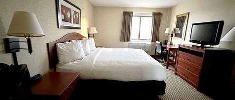 Room, 1 King Bed, Non Smoking | Premium bedding, pillowtop beds, iron/ironing board, free WiFi