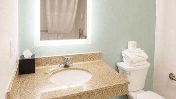 Room, 1 King Bed, Non Smoking (Mobility, Roll-in Shower) | Bathroom | Combined shower/tub, eco-friendly toiletries, hair dryer, towels
