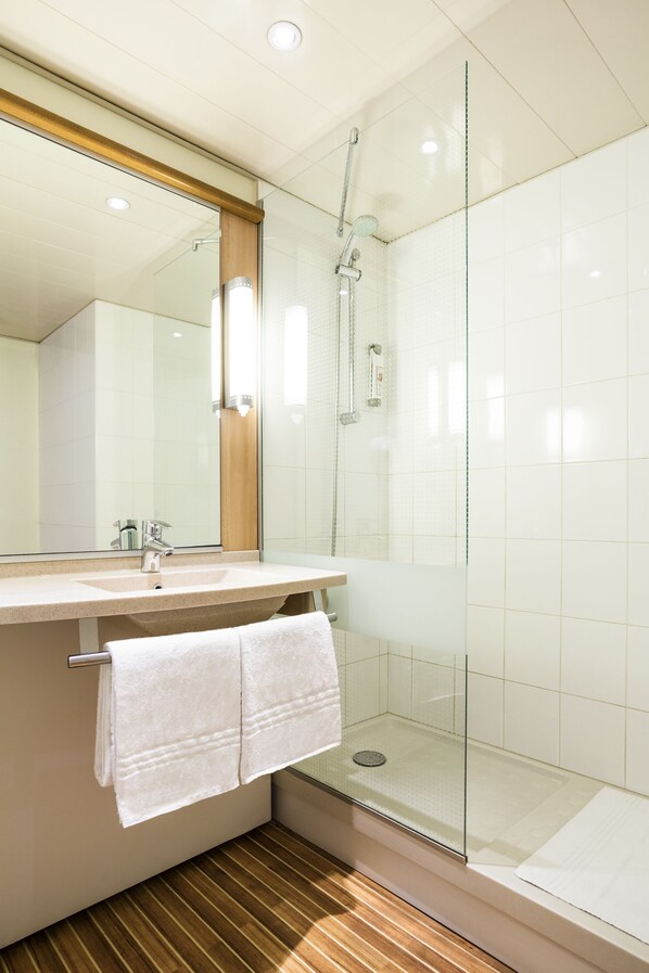 Shower, rainfall showerhead, eco-friendly toiletries, hair dryer