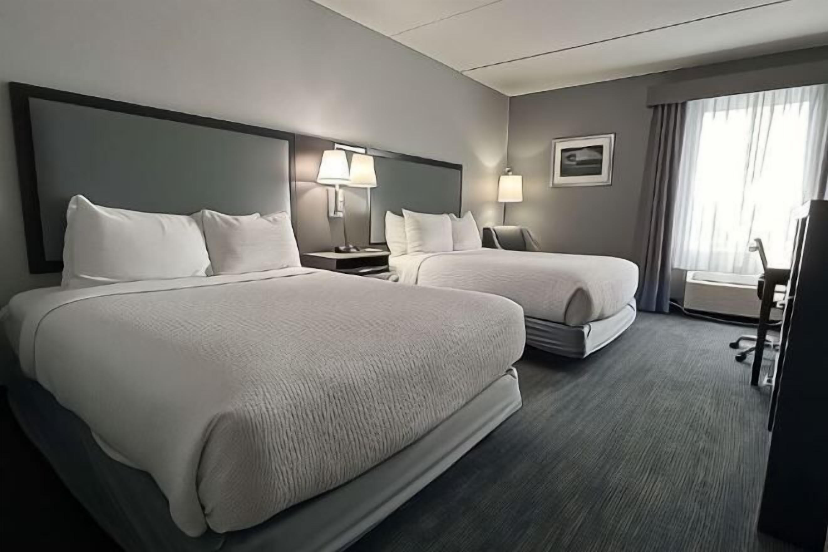 Seprai premium, selimut bulu angsa, dan tempat tidur Select Comfort