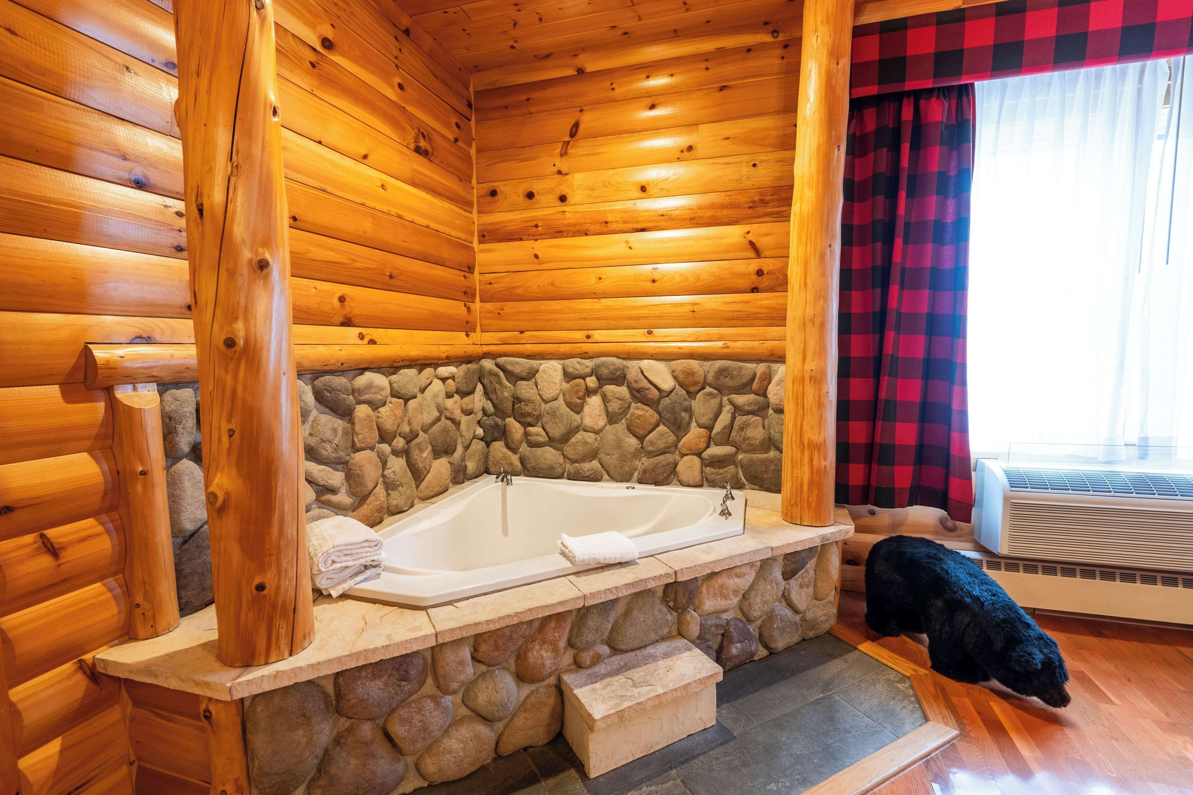 suite, 1 king bed, non smoking, jetted tub | premium bedding, laptop workspace, blackout curtains, iron/ironing board