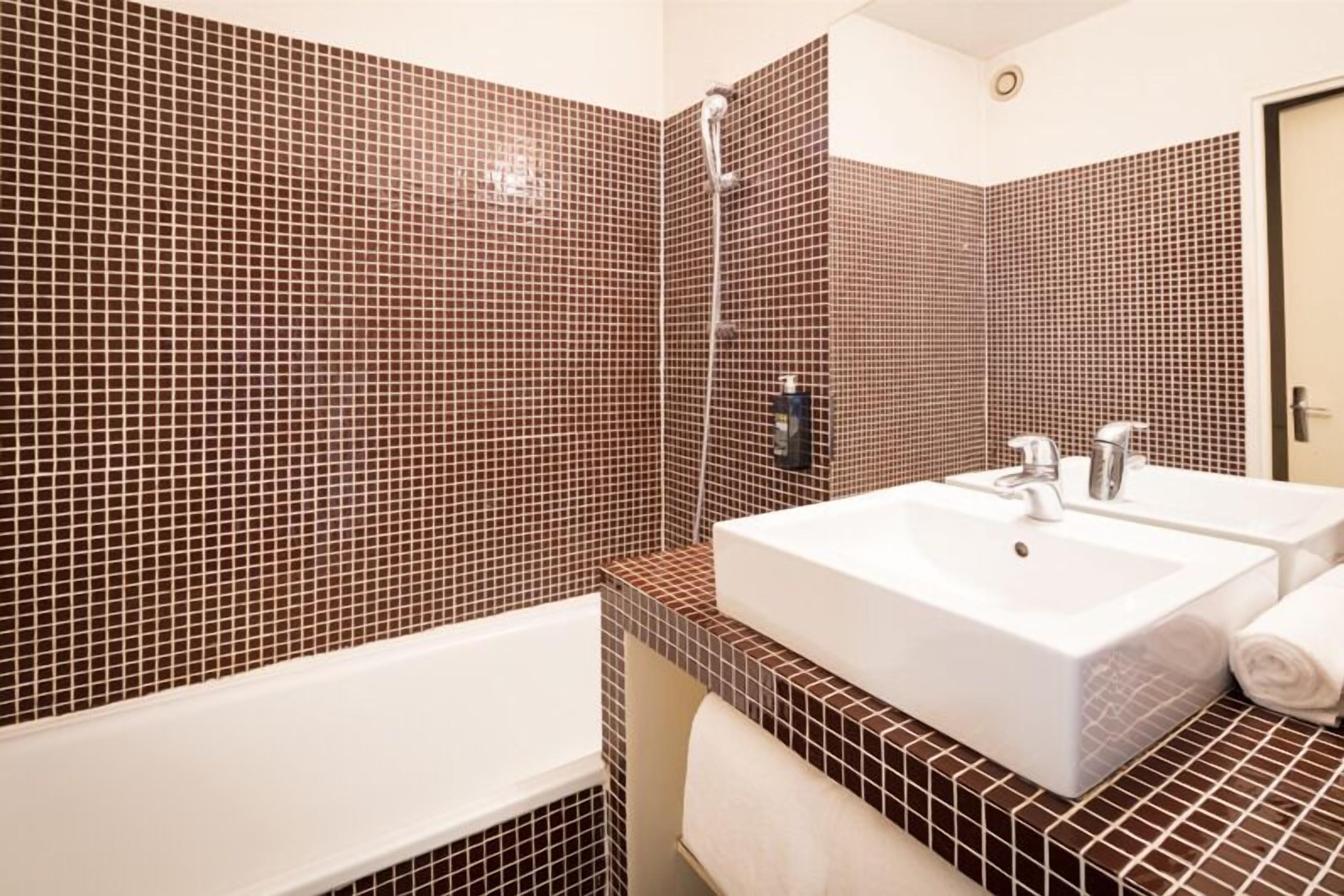 classic double room | bathroom | hair dryer, towels, soap, shampoo
