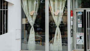 A hotel entrance with a sign reading "HOTEL ORSAY". - Hôtel d'Orsay  (Toulouse)