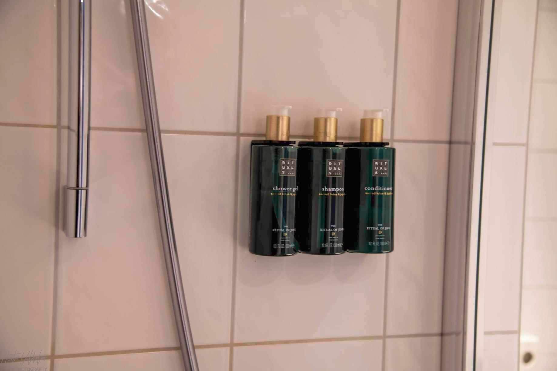 shower, eco-friendly toiletries, hair dryer, slippers