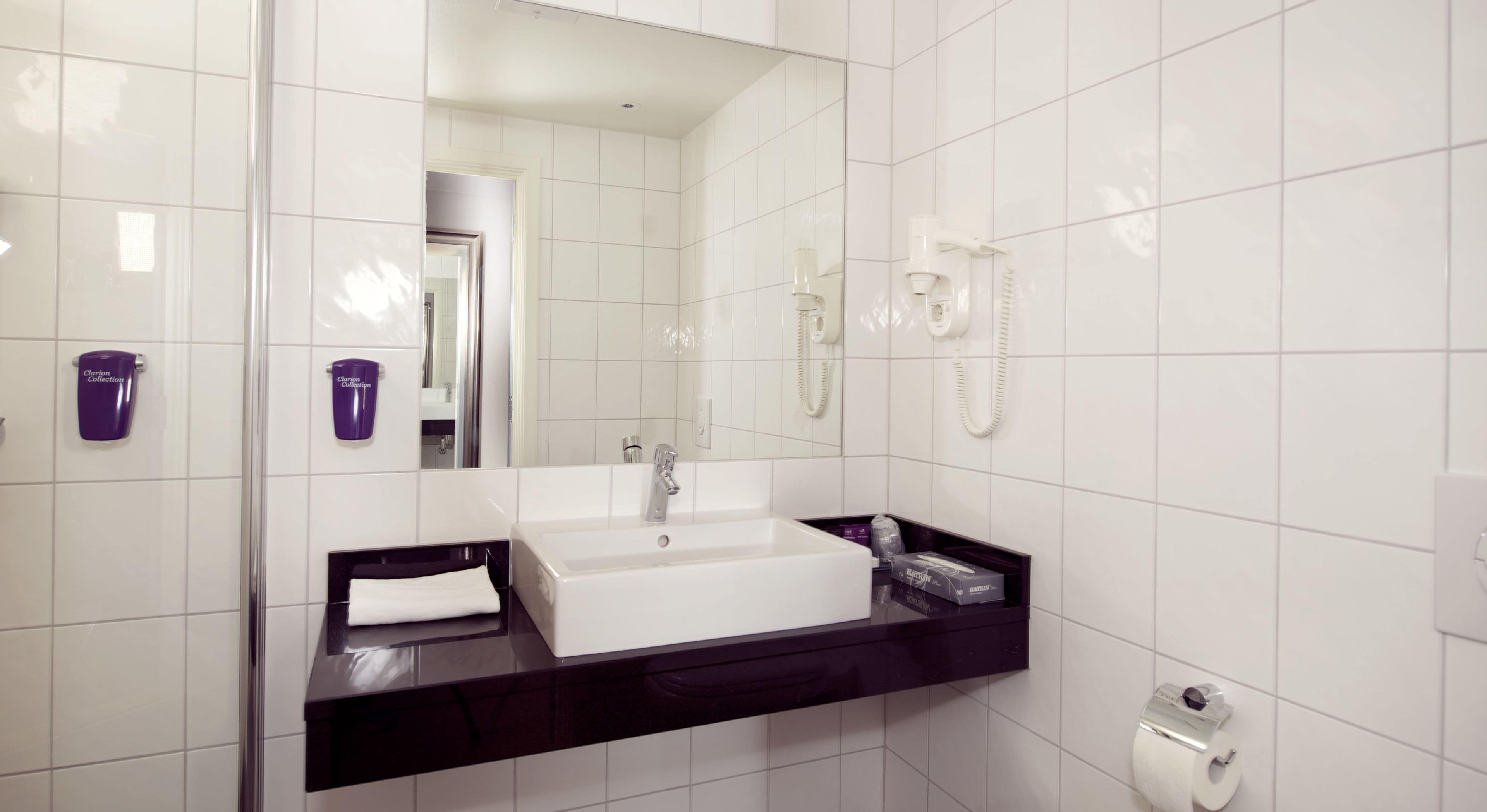 shower, eco-friendly toiletries, hair dryer, slippers