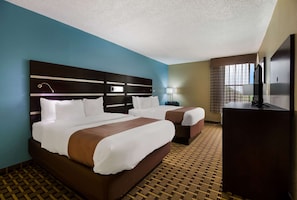 Room, 2 Queen Beds, Non Smoking | Pillowtop beds, desk, laptop workspace, blackout drapes