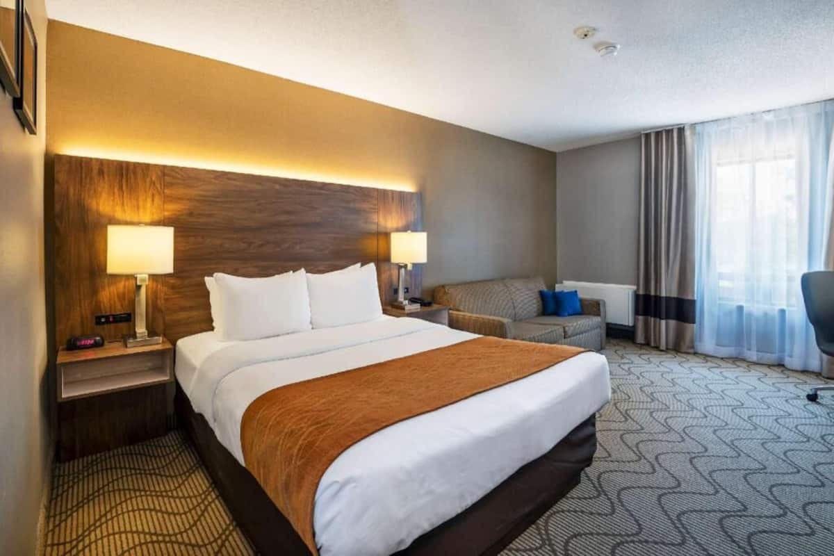 Premium bedding, desk, blackout drapes, iron/ironing board