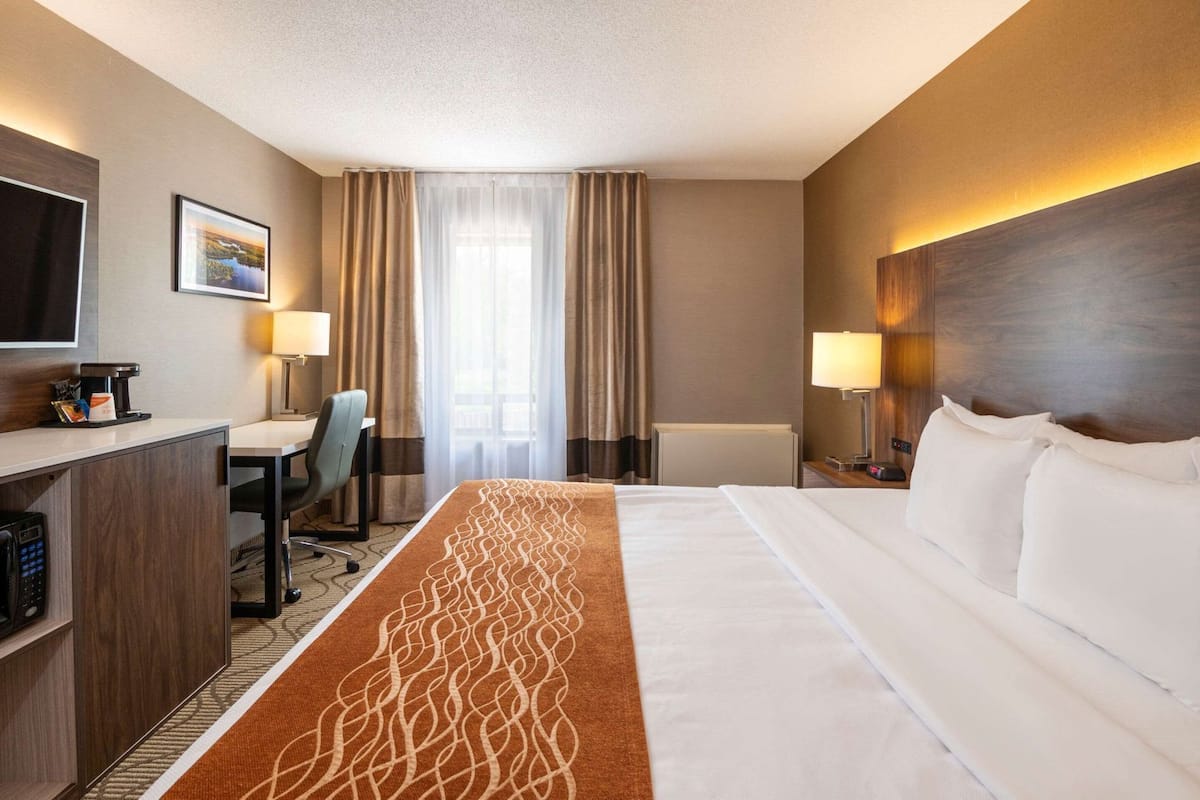 Premium bedding, desk, blackout drapes, iron/ironing board