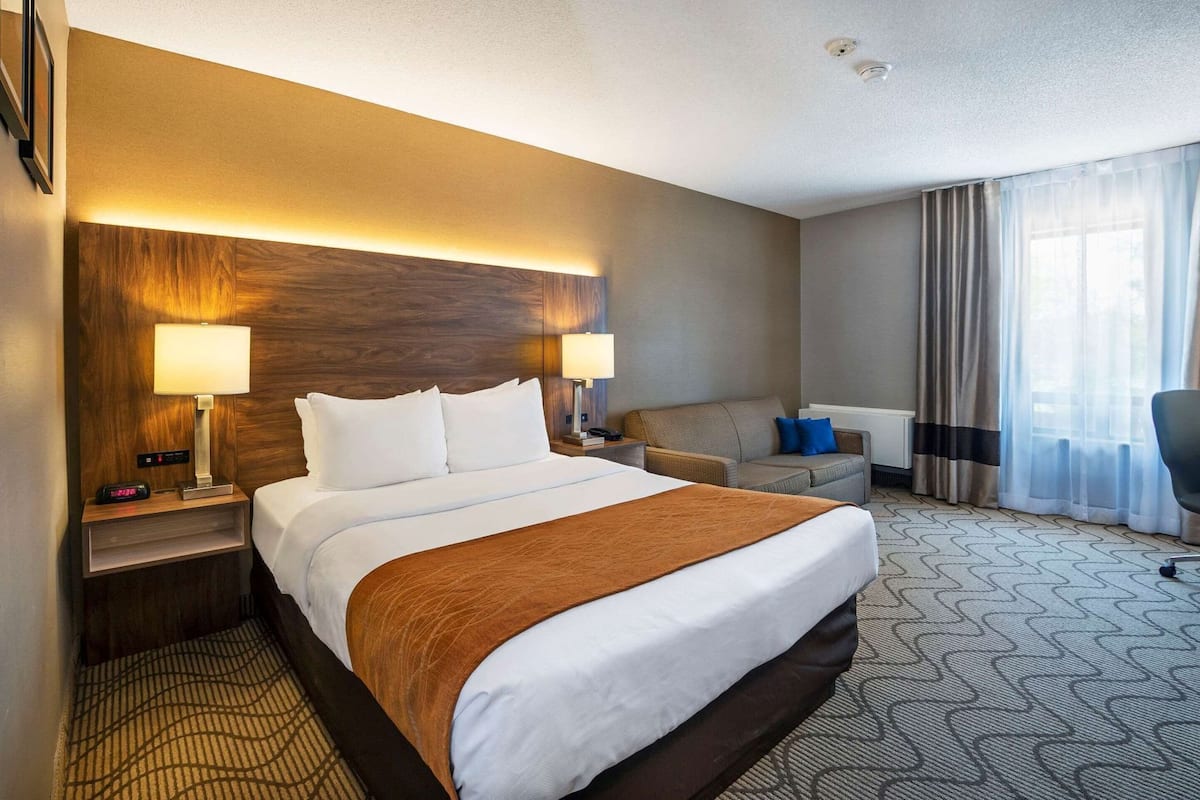 Premium bedding, desk, blackout drapes, iron/ironing board