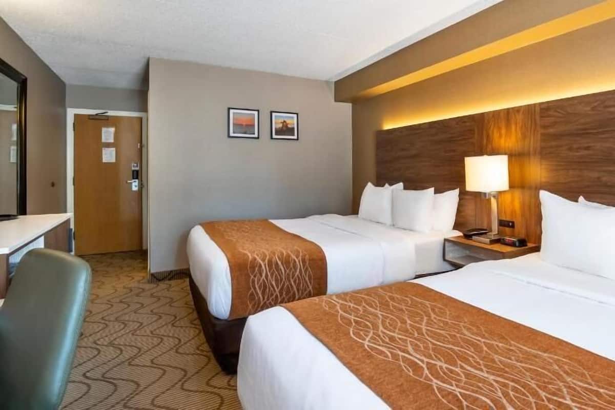 Premium bedding, desk, blackout drapes, iron/ironing board