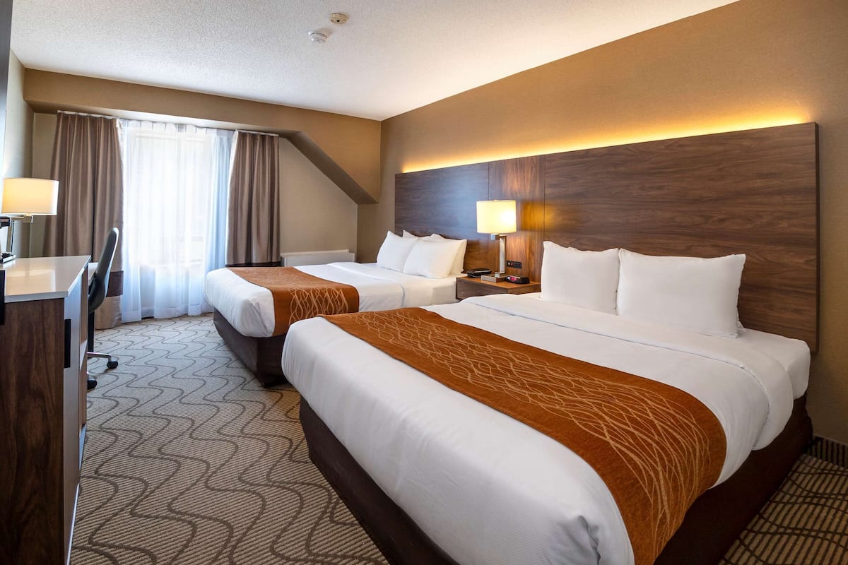 Standard room, 2 Queen Beds, Nonsmoking/Upper Floor | Premium bedding, desk, blackout drapes, iron/ironing board