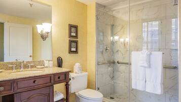 Shower, eco-friendly toiletries, hair dryer, bathrobes