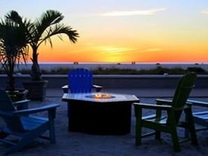 On the beach, white sand, beach towels, beach bar