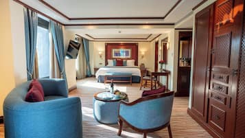Superior Room | Living area | 21-inch LCD TV with satellite channels, TV, pay films