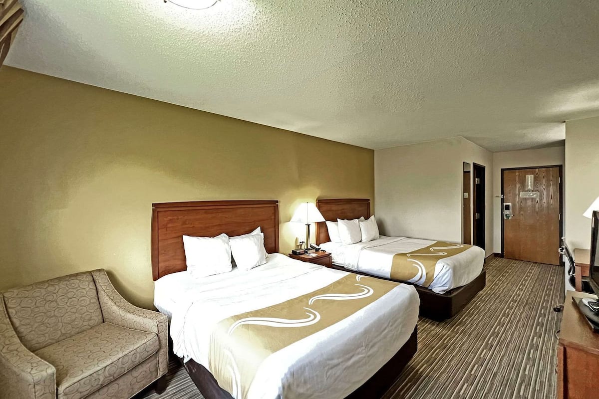 Desk, blackout drapes, iron/ironing board, free cribs/infant beds