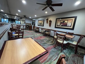 Enjoy meals and gatherings around the dining table with comfortable seating for all.