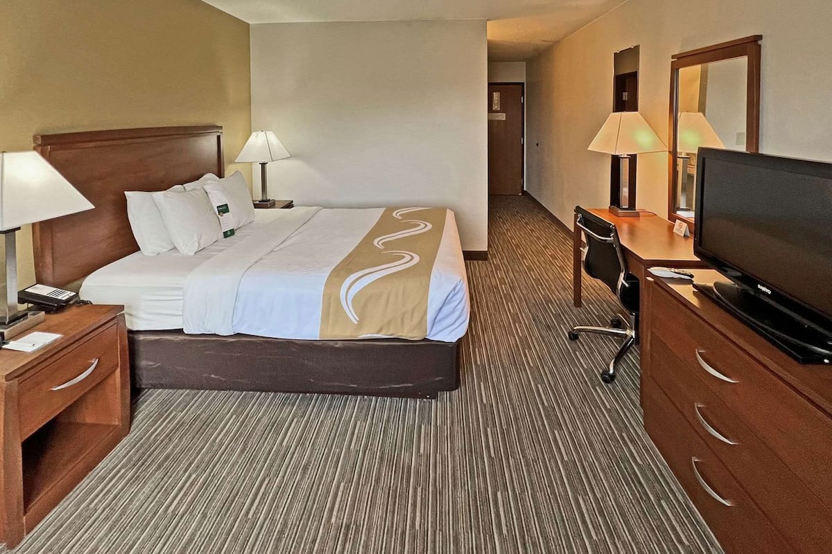 Desk, blackout drapes, iron/ironing board, free cribs/infant beds