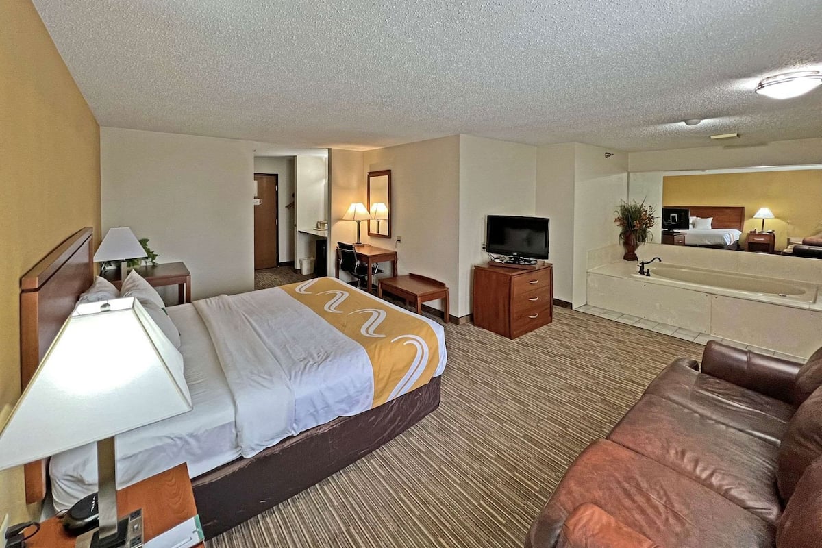 Desk, blackout drapes, iron/ironing board, free cribs/infant beds