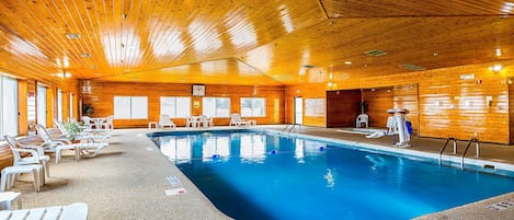 Indoor pool, open 8 AM to midnight, pool loungers